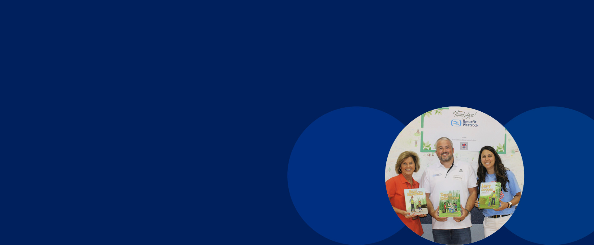 group picture holding books