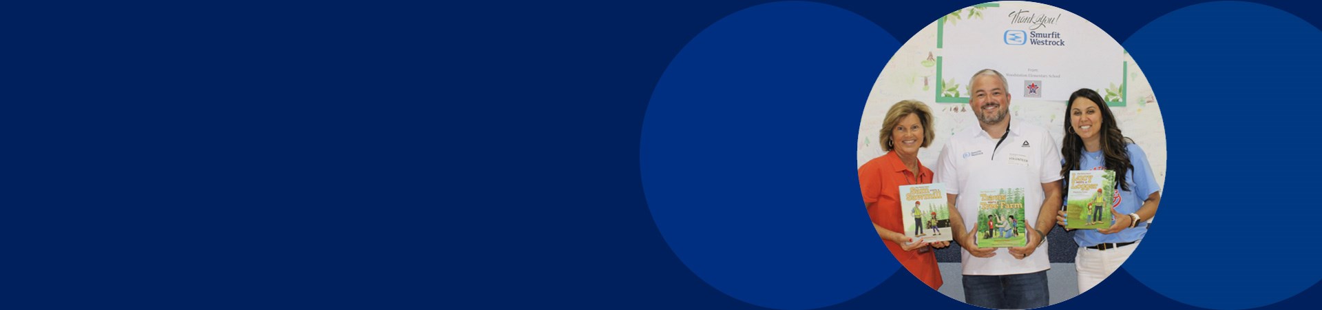 group picture holding books